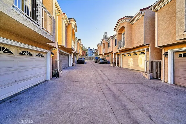 a view of a street with big building