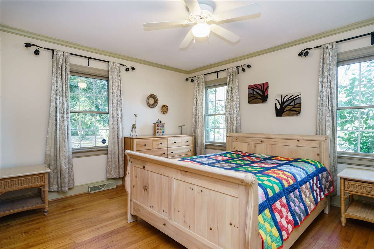 205 Lord Berkley Road Raleigh, NC 27610 - Photo 25 of 25 Large first floor master bedroom or use the upstairs space as master suite with view of the trees. Floor plan is versatile.