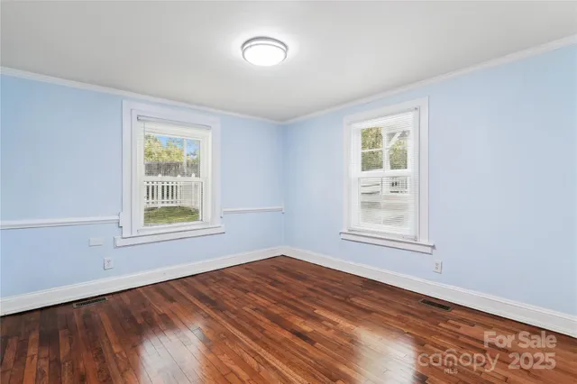 an empty room with windows