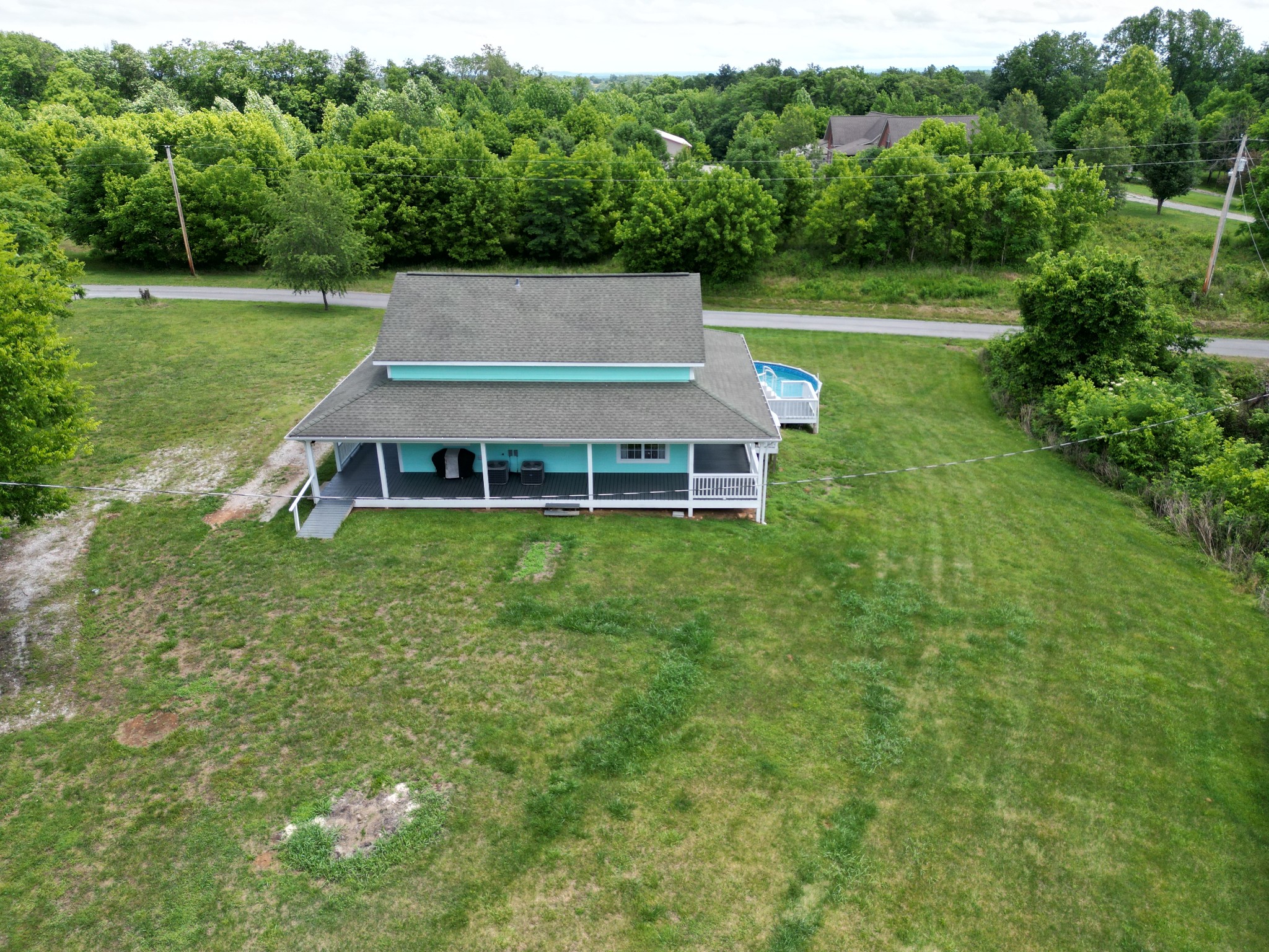 581 Shady Grove Road Bloomington Springs, TN 38545 - Photo 10 of 42 an aerial view of a house