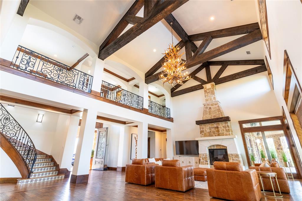 1180 McReynolds Road Sanger, TX 76266 - Photo 13 of 36 a living room with furniture and a fireplace