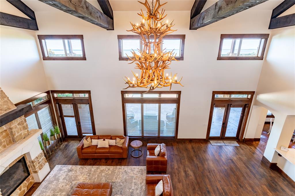 1180 McReynolds Road Sanger, TX 76266 - Photo 14 of 36 a living room with furniture and a flat screen tv