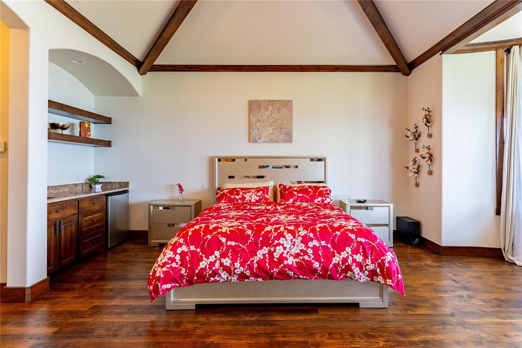 1180 McReynolds Road Sanger, TX 76266 - Photo 22 of 36 a bedroom with a bed and a window