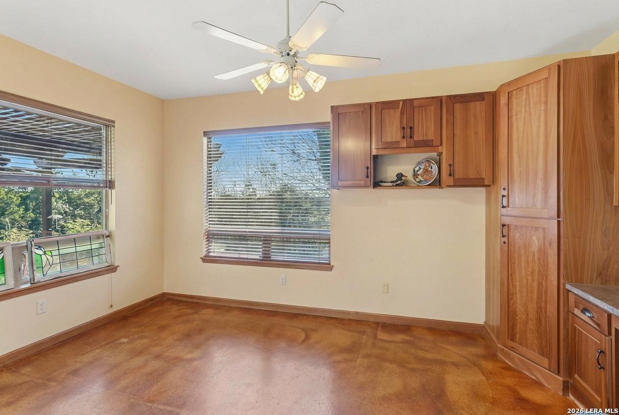 9623 Requa Road Helotes, TX 78023 - Photo 19 of 49 a view of an empty room with a window
