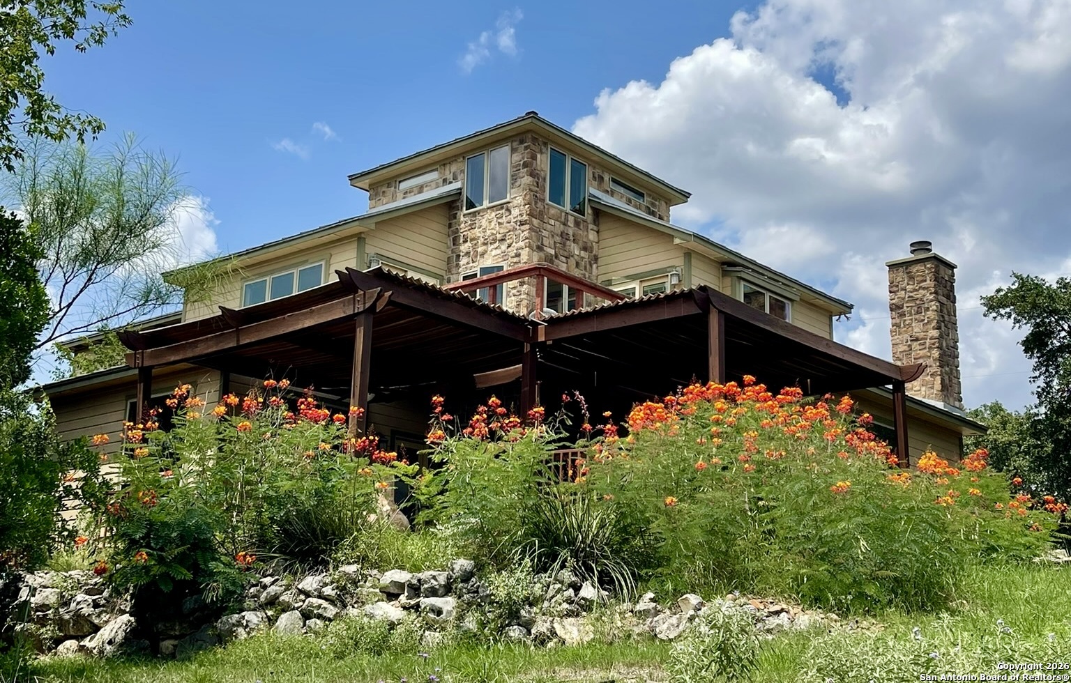 9623 Requa Road Helotes, TX 78023 - Photo 2 of 49 a front view of a house