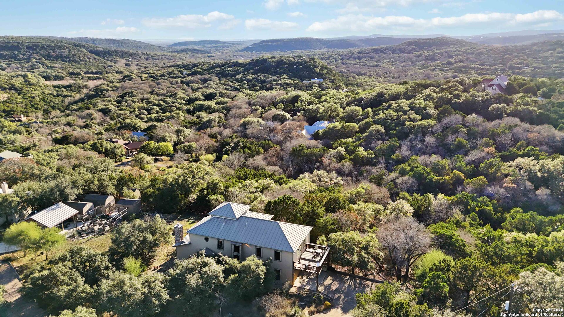 9623 Requa Road Helotes, TX 78023 - Photo 2 of 49 an aerial view of residential houses with outdoor space