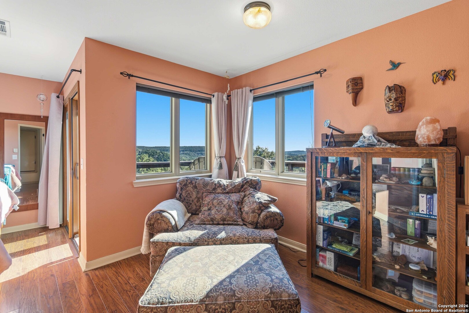 9623 Requa Road Helotes, TX 78023 - Photo 25 of 49 a living room with furniture and a large window