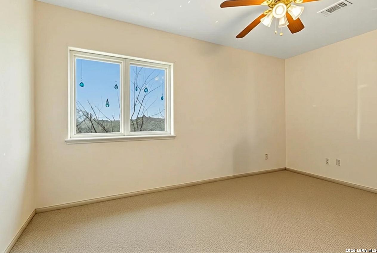 9623 Requa Road Helotes, TX 78023 - Photo 32 of 49 an empty room with a window
