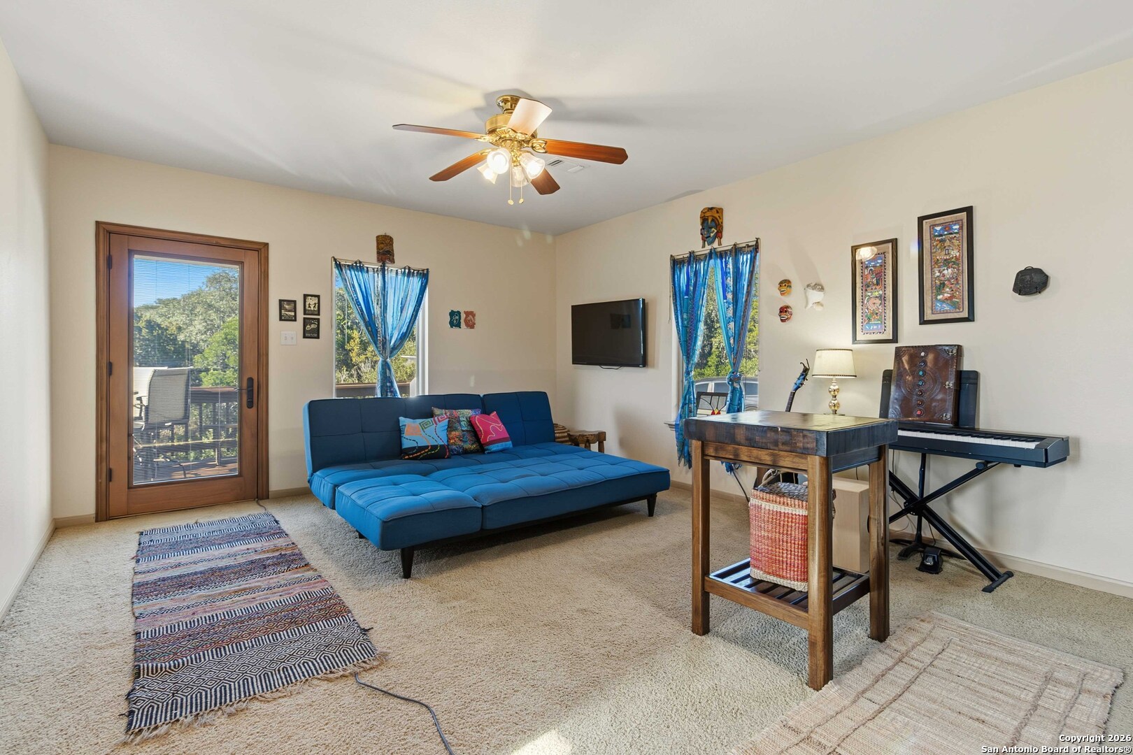 9623 Requa Road Helotes, TX 78023 - Photo 35 of 49 a living room with furniture and a wooden floor