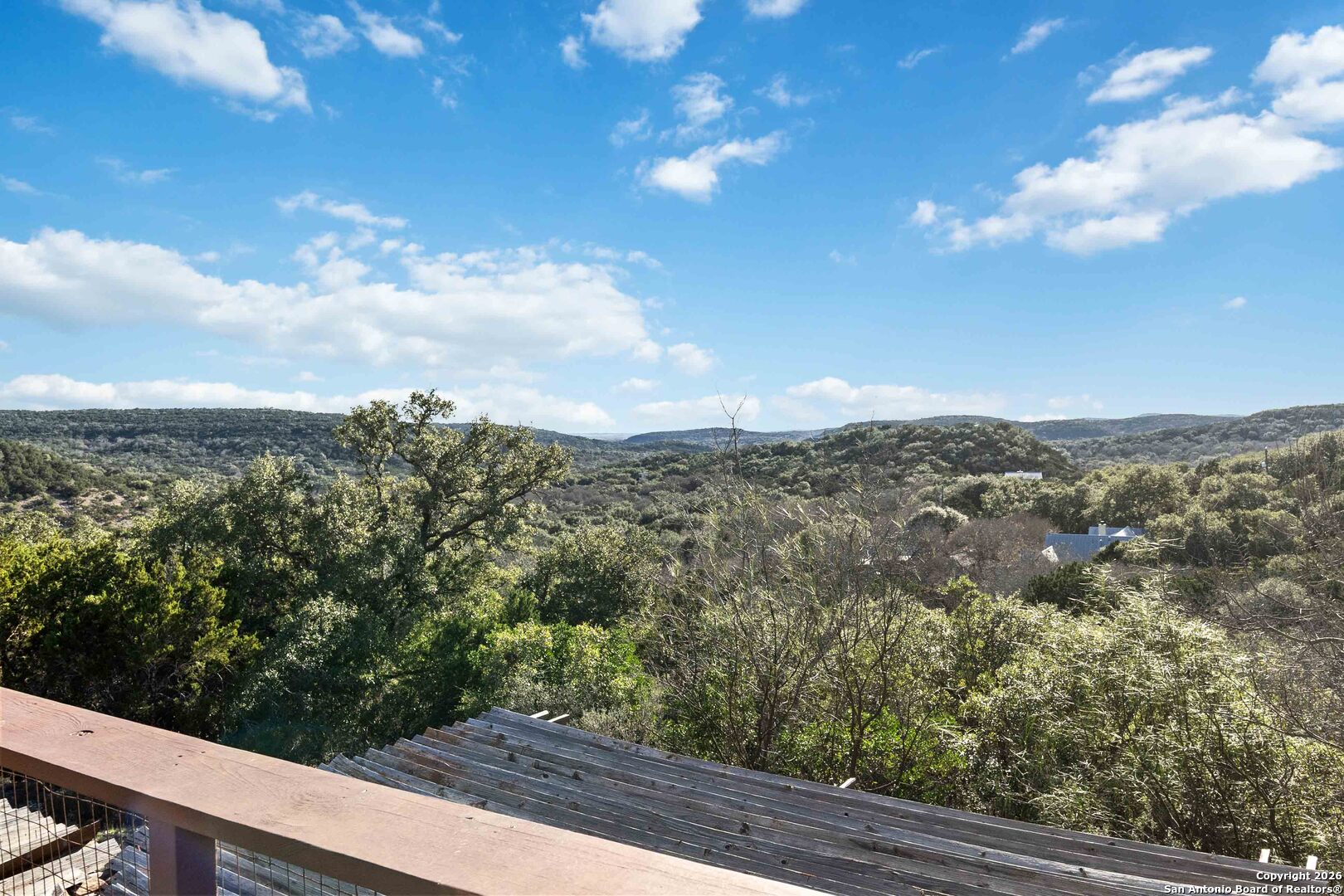 9623 Requa Road Helotes, TX 78023 - Photo 6 of 49 a view of a city from a balcony