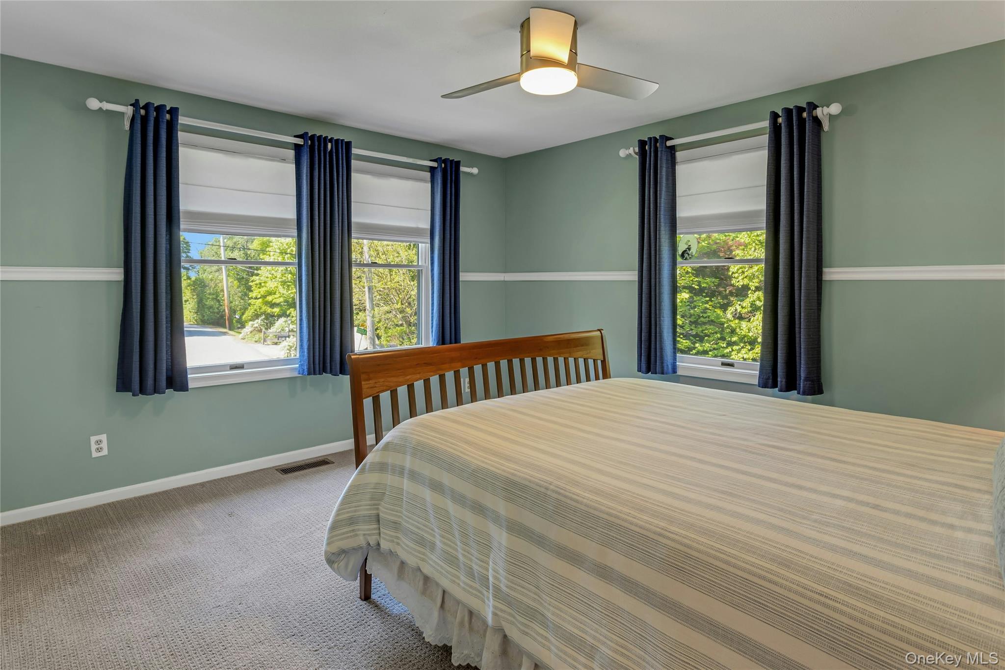 340 Osceola Road Jefferson Valley, NY 10535 - Photo 23 of 48 a bedroom with a bed and a window