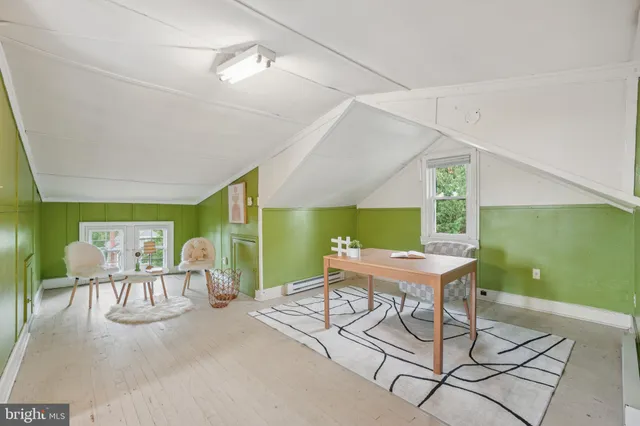 a workspace with furniture and a table