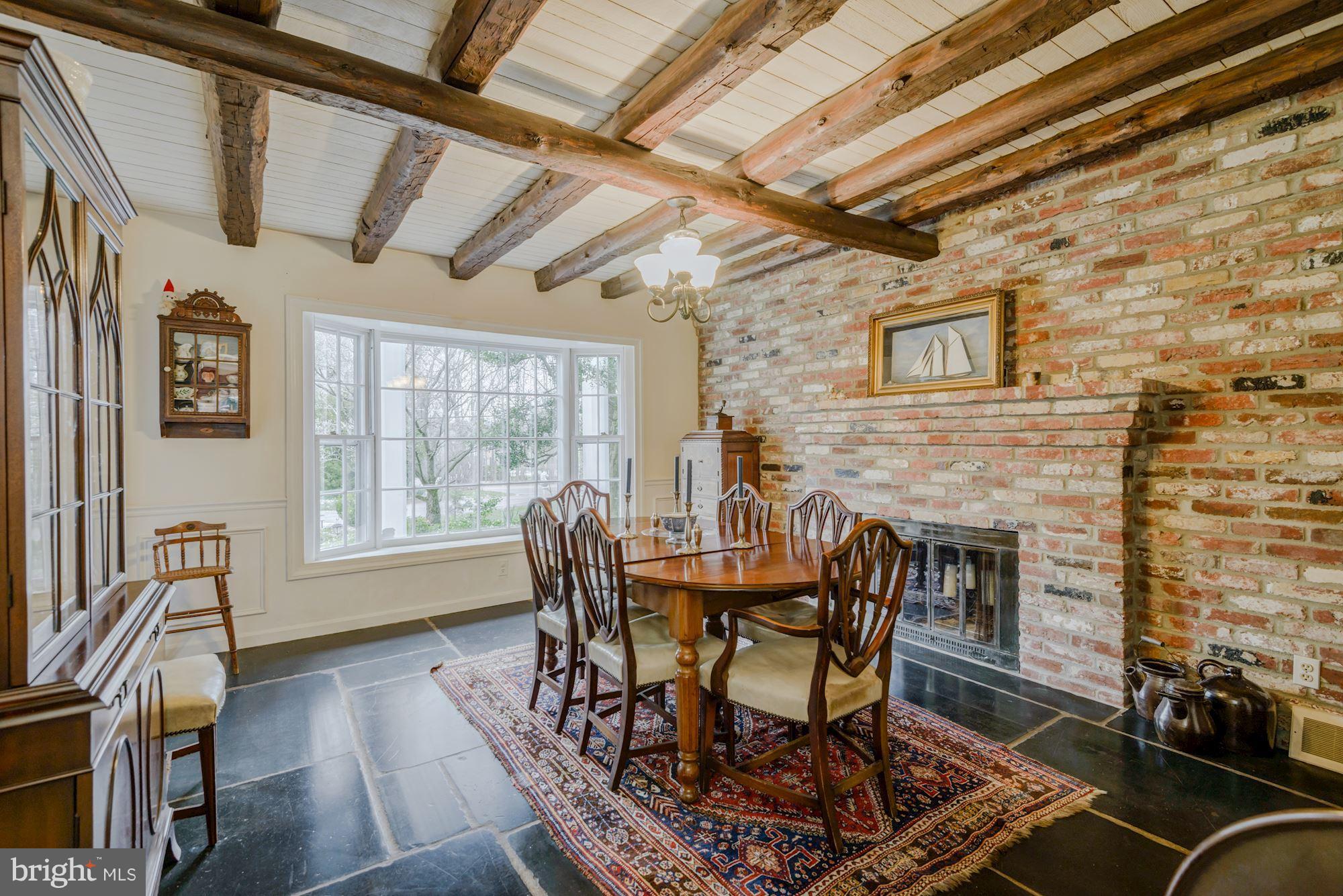 629 Springvale Road Great Falls, VA 22066 - Photo 14 of 26 Historic brick wall and beamed ceiling