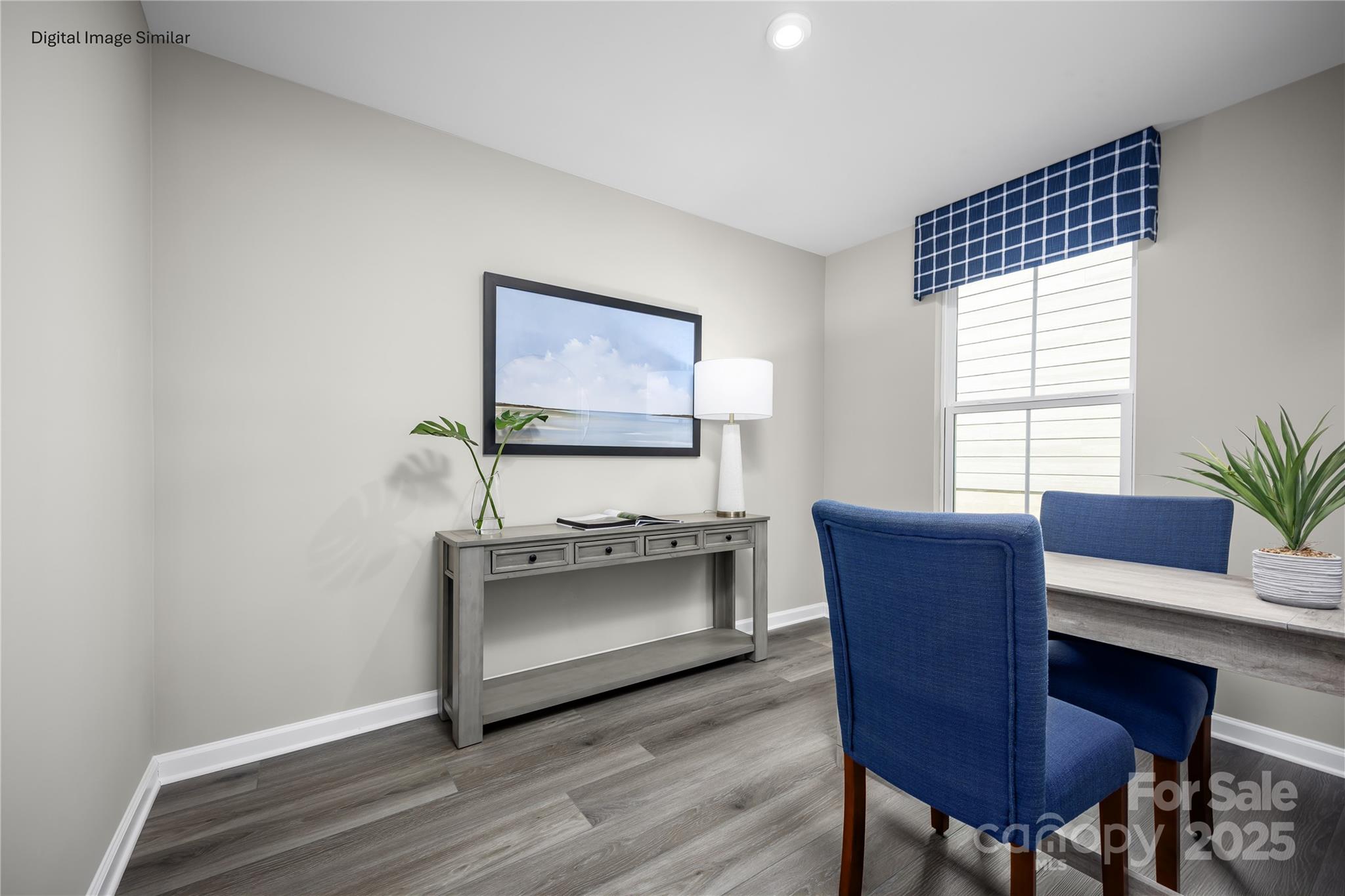 174 Basildon Street, Unit 1061 Lancaster, SC 29720 - Photo 4 of 4 a living room with furniture and a flat screen tv