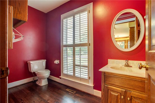 2006 Hartland Road Franklin, TN 37069 - Photo 8 of 20 Utility room / 2nd first floor half bath with hardwood flooring.