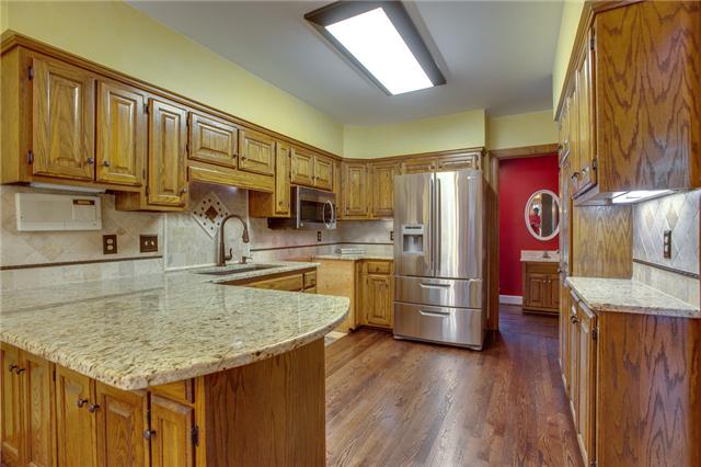 2006 Hartland Road Franklin, TN 37069 - Photo 9 of 20 Kitchen has hardwood and granite.