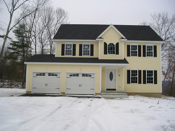 5 Paradise Lake Road Monson, MA 01057 - Photo 1 of 1 a front view of a house with a parking space