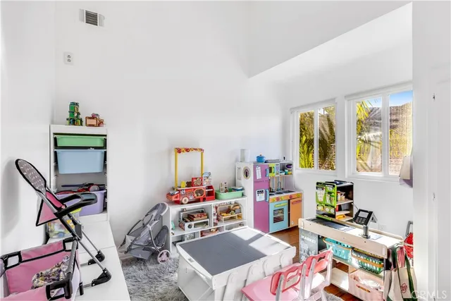 a room with furniture and a wooden floor