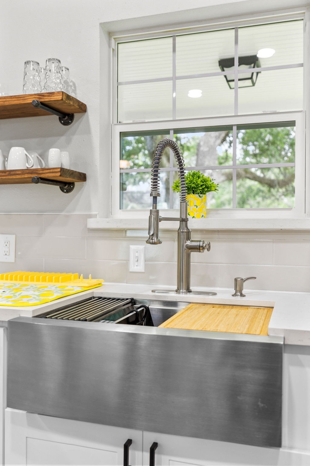 412 Waco Avenue League City, TX 77573 - Photo 20 of 28 a view of a kitchen with a sink and a bath tub