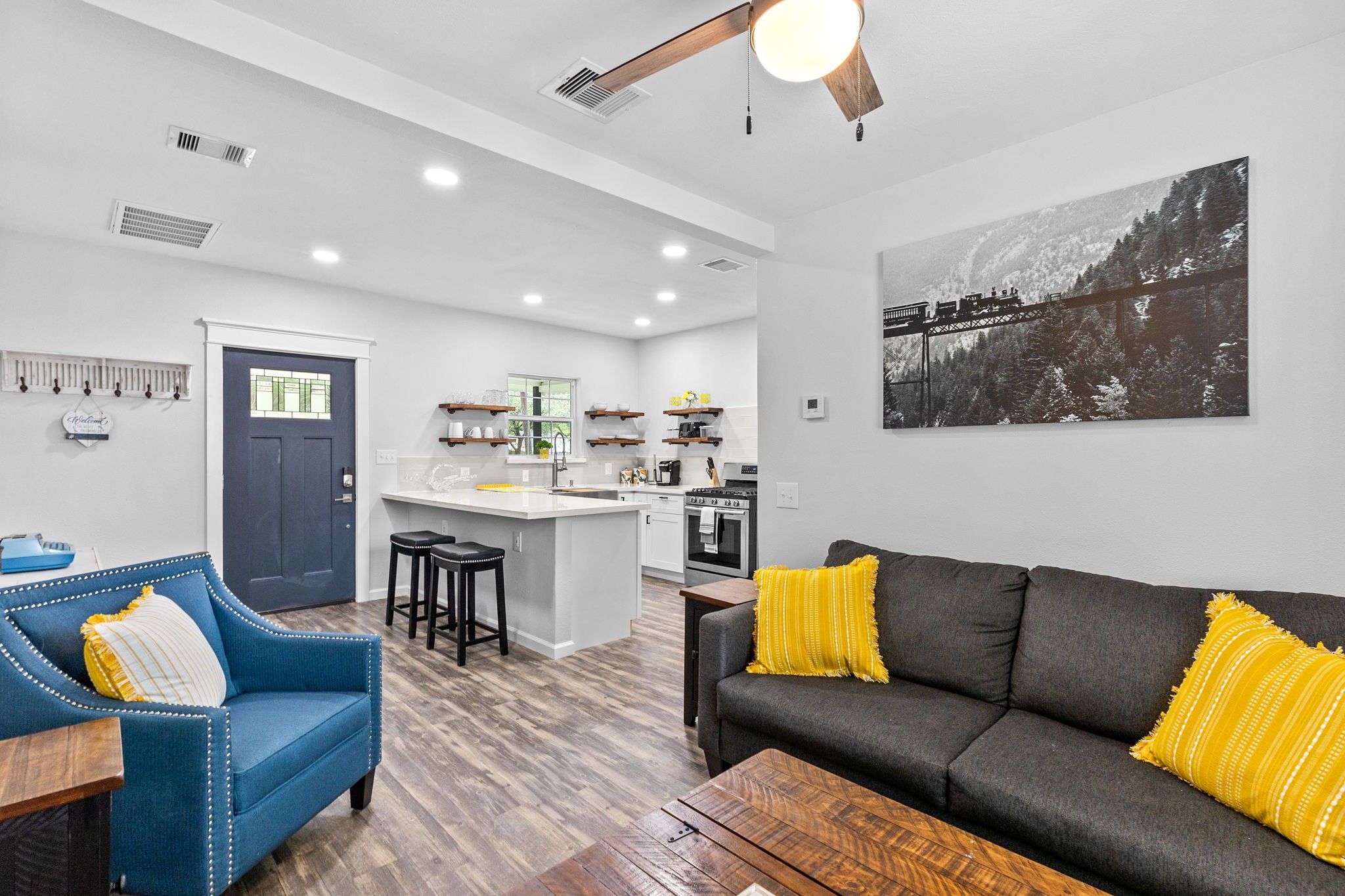 412 Waco Avenue League City, TX 77573 - Photo 2 of 28 a living room with furniture and kitchen view