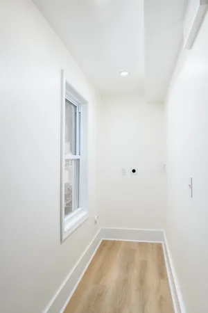 a view of a small space with a window