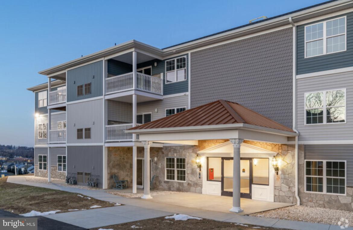 100 Lucky Way Reading, PA 19608 - Photo 2 of 6 a front view of a house with a yard