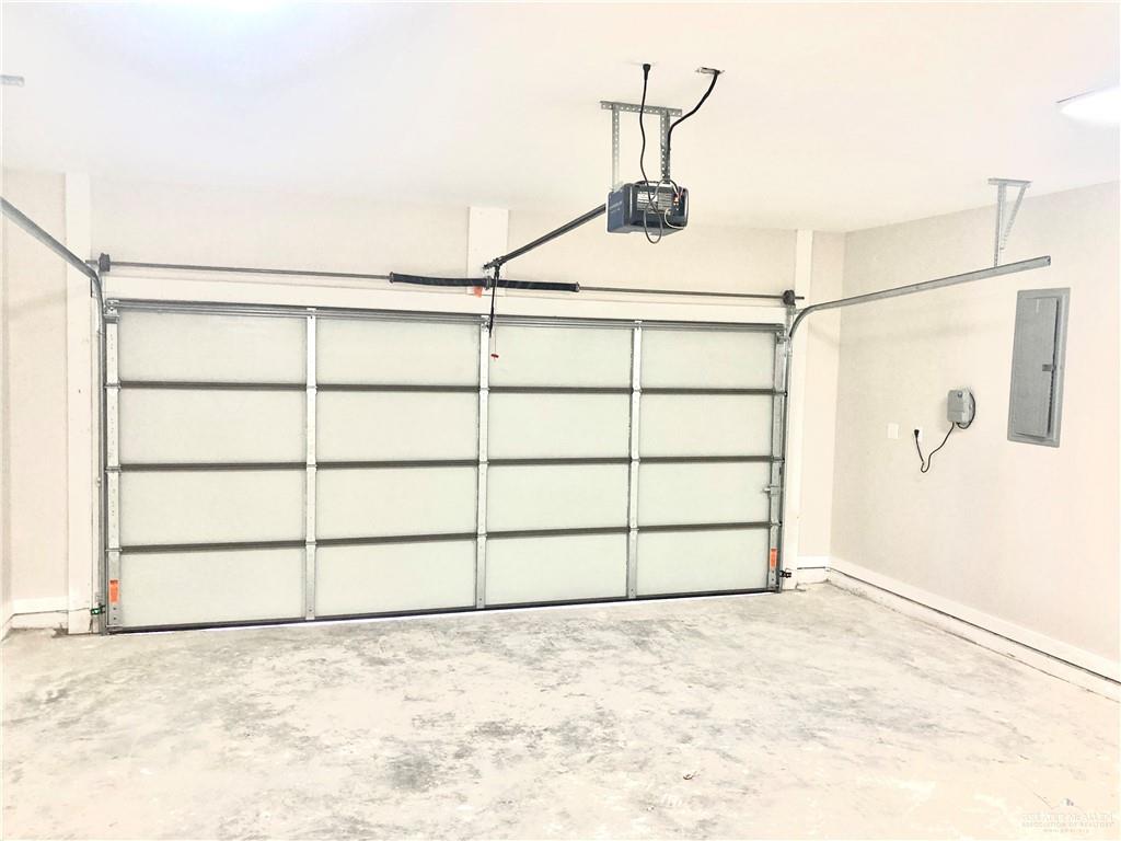 2218 Corales Street Mission, TX 78573 - Photo 22 of 22 a view of a room with rack on the wall