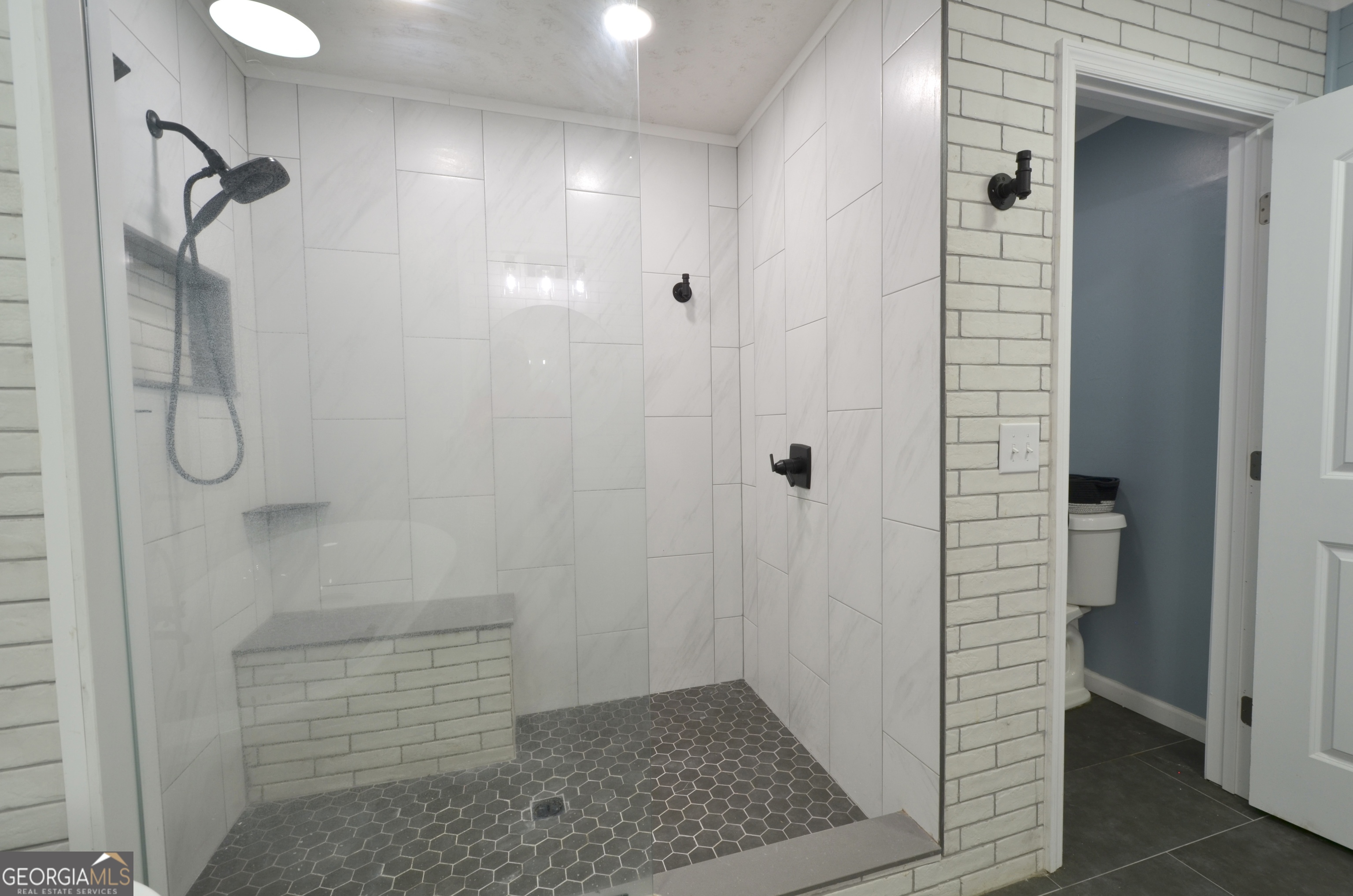 228 Legion Drive Eastman, GA 31023 - Photo 18 of 37 a bathroom with a shower