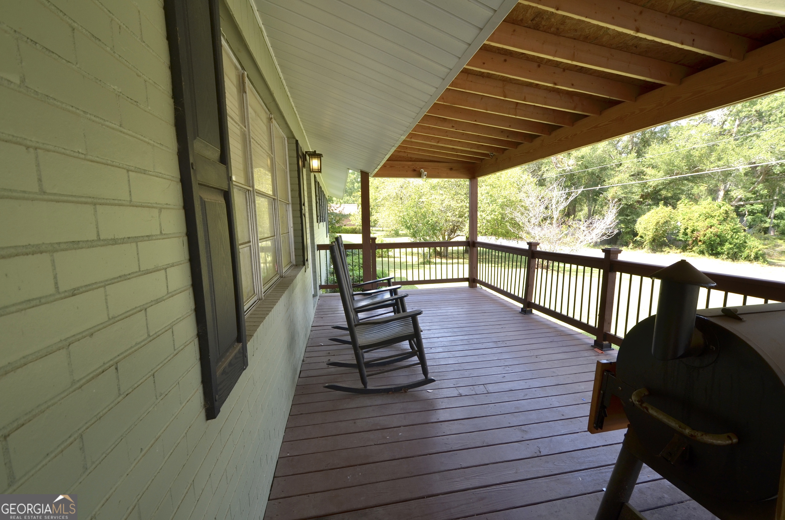 228 Legion Drive Eastman, GA 31023 - Photo 6 of 37 a view of a balcony with wooden floor