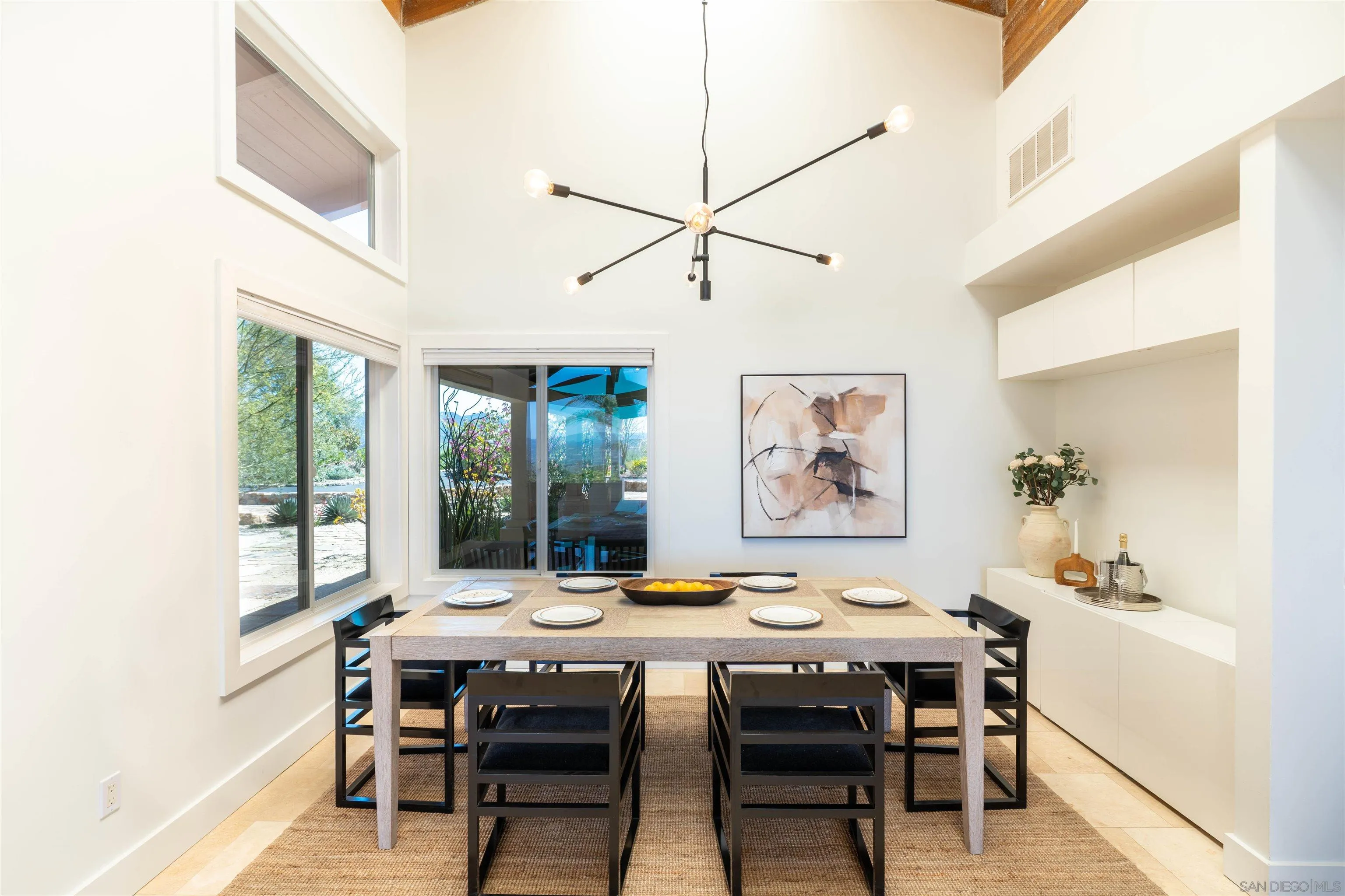 30410 Calle La Reina Bonsall, CA 92003 - Photo 15 of 54 a dining room with furniture and window