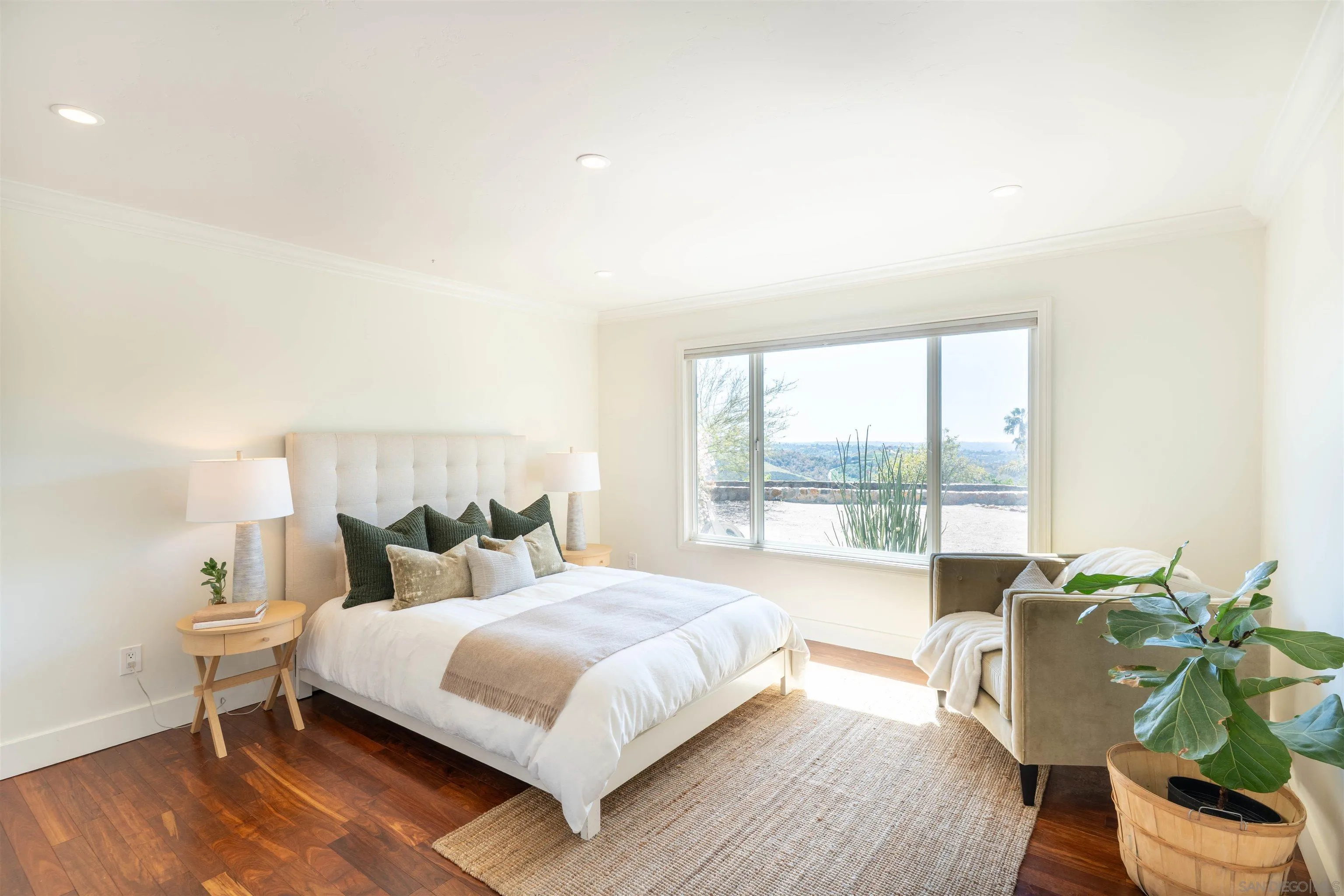 30410 Calle La Reina Bonsall, CA 92003 - Photo 20 of 54 a bedroom with a bed and a window