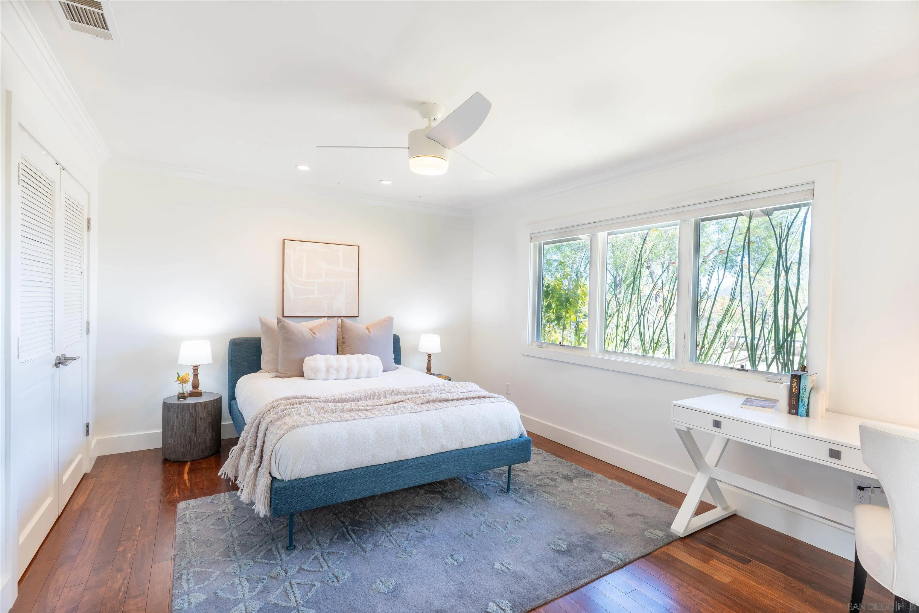 30410 Calle La Reina Bonsall, CA 92003 - Photo 23 of 54 a bedroom with a bed and a desk