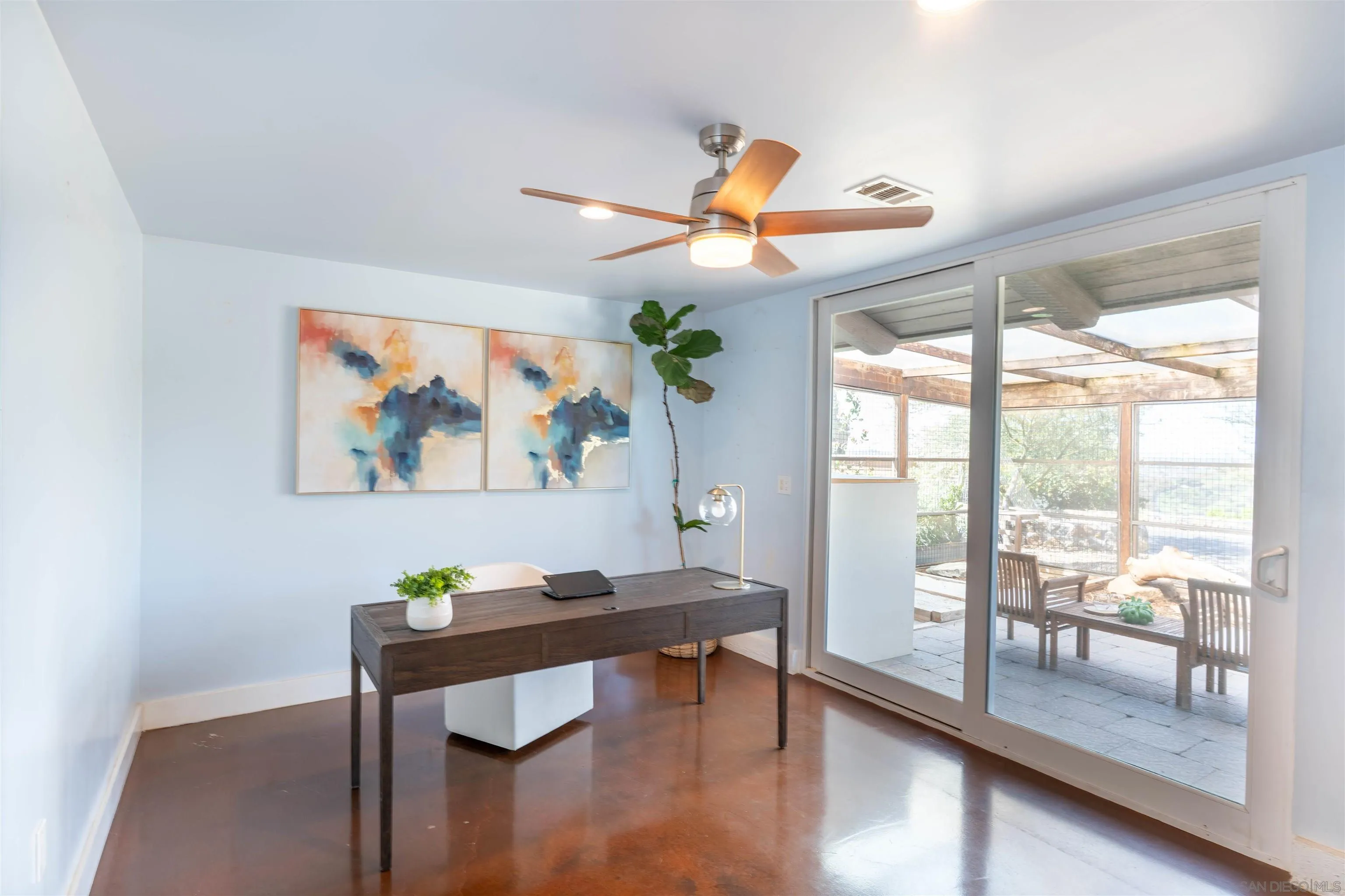 30410 Calle La Reina Bonsall, CA 92003 - Photo 29 of 54 a dining room with furniture and wooden floor