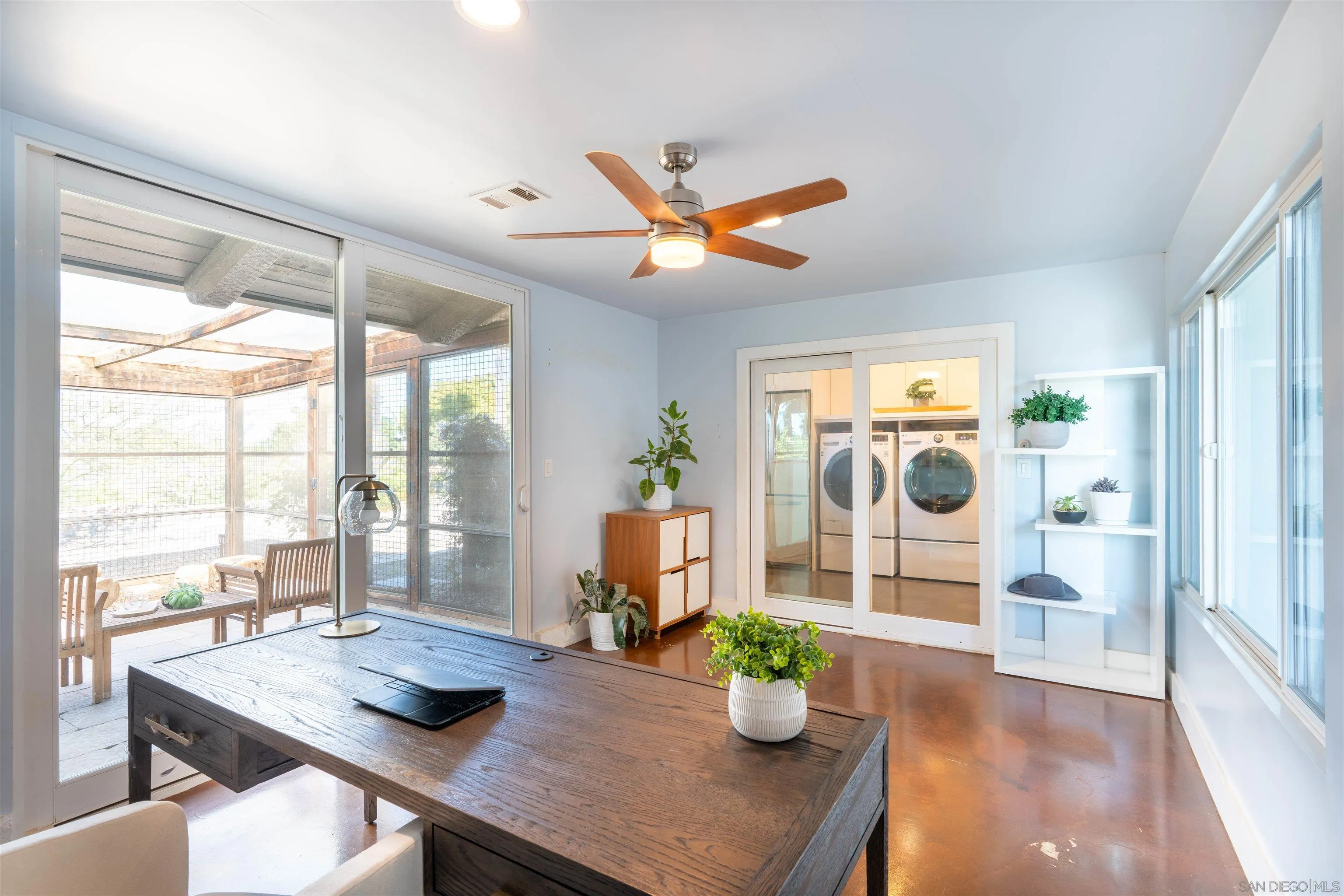 30410 Calle La Reina Bonsall, CA 92003 - Photo 30 of 54 a living room with furniture and a window