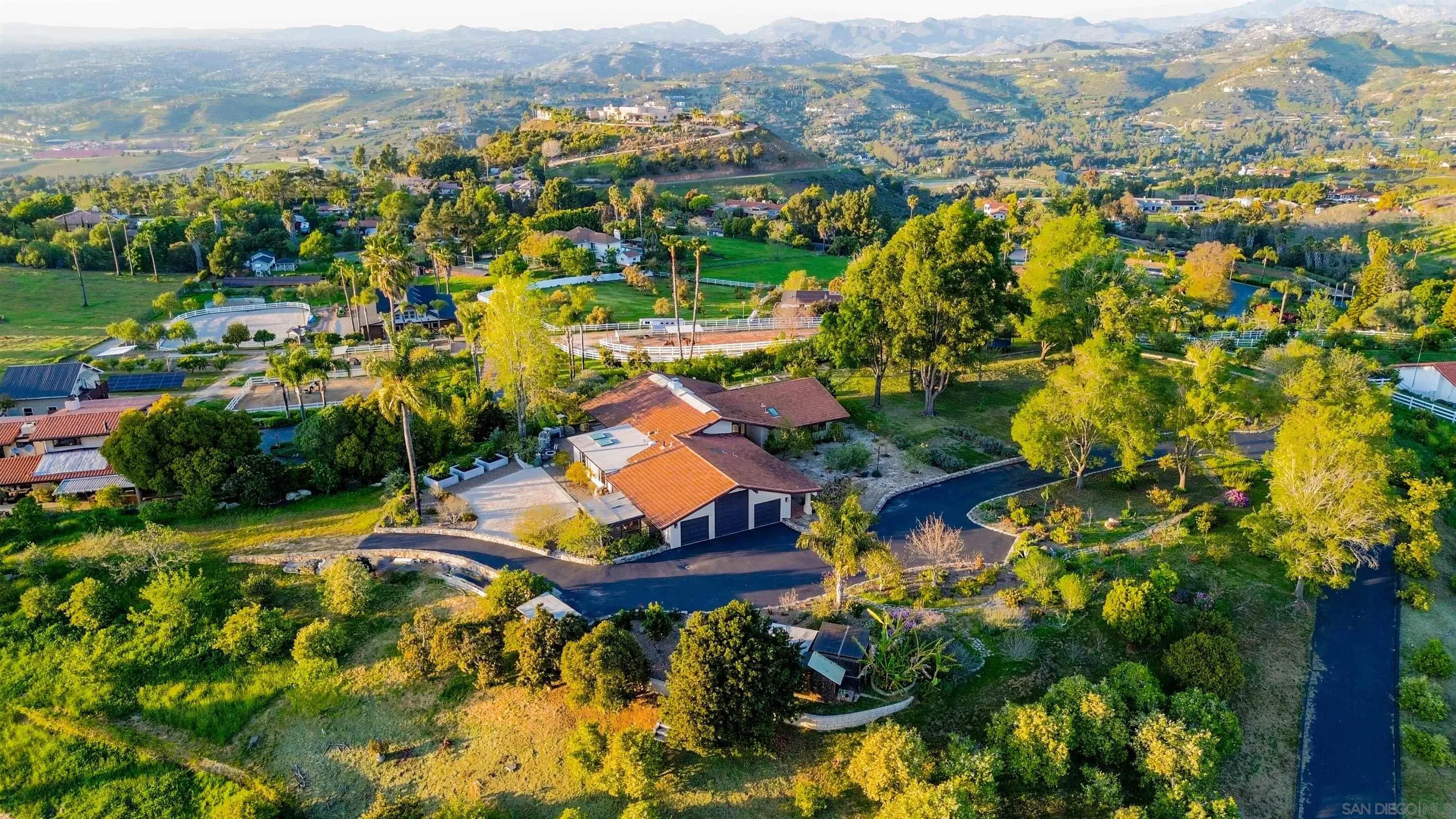 30410 Calle La Reina Bonsall, CA 92003 - Photo 3 of 54 an aerial view of residential houses with outdoor space and trees