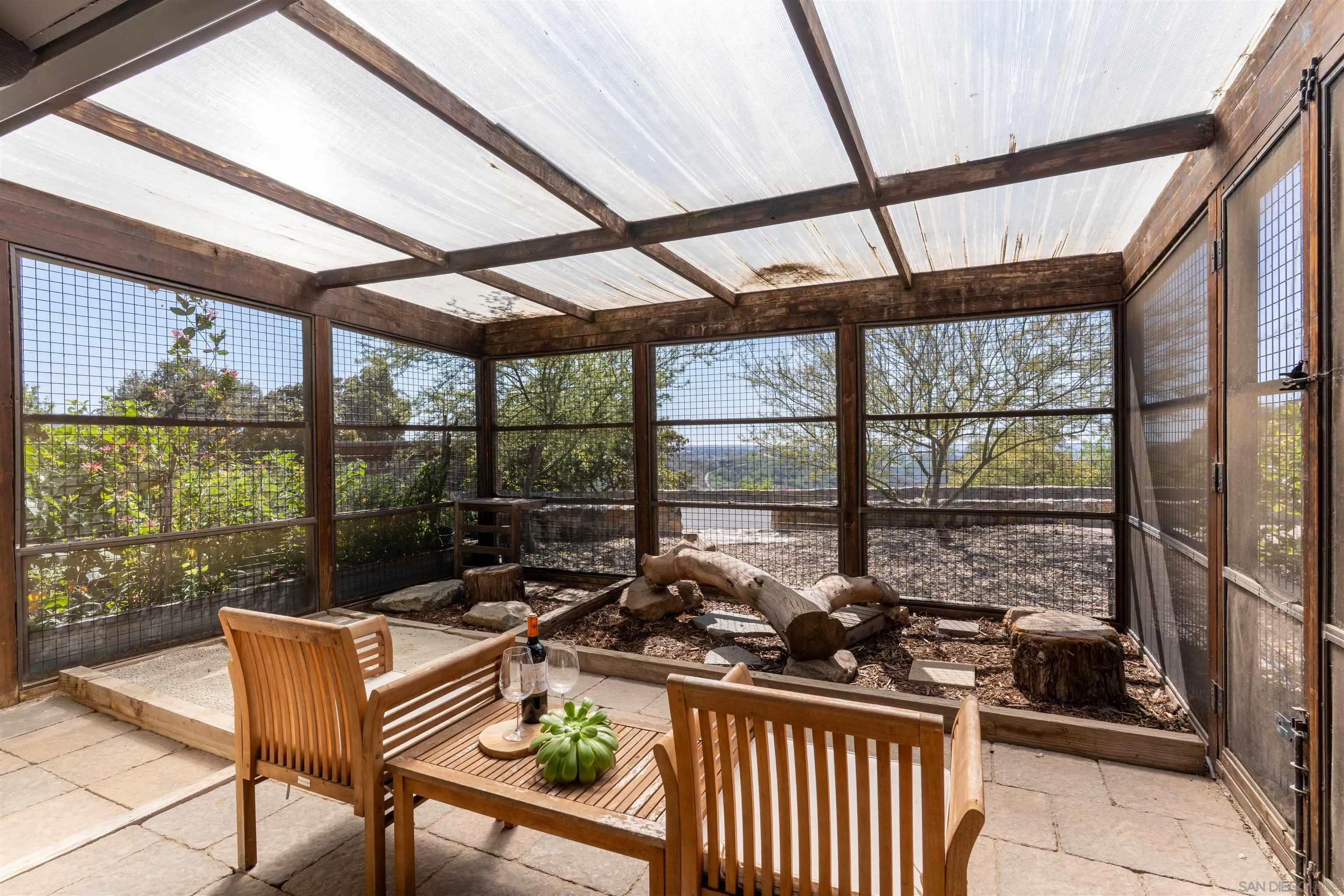30410 Calle La Reina Bonsall, CA 92003 - Photo 31 of 54 a view of sitting area with furniture and wooden deck