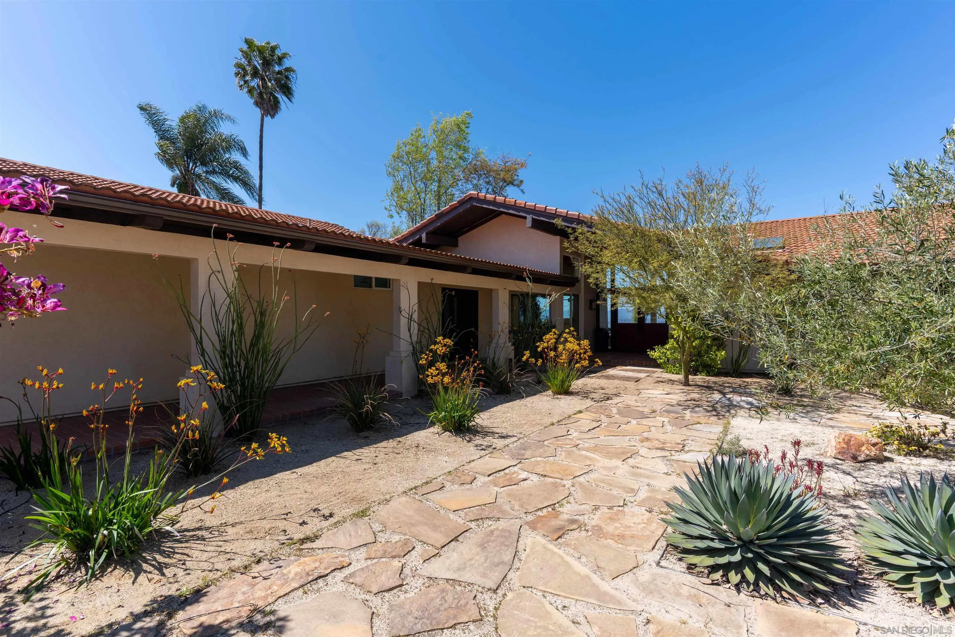 30410 Calle La Reina Bonsall, CA 92003 - Photo 36 of 54 a view of a house with a patio