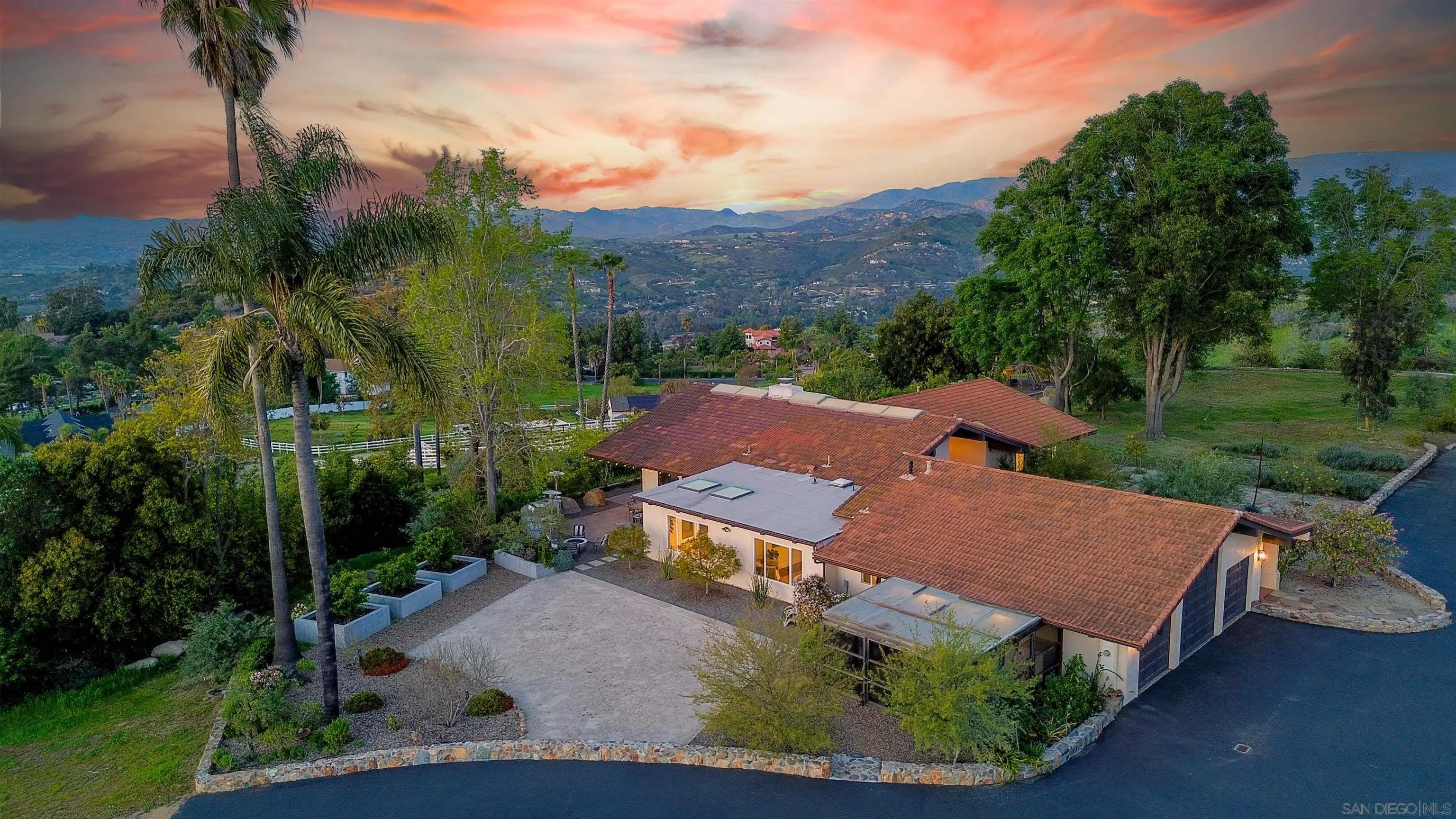 30410 Calle La Reina Bonsall, CA 92003 - Photo 47 of 54 an aerial view of a house with garden space and street view