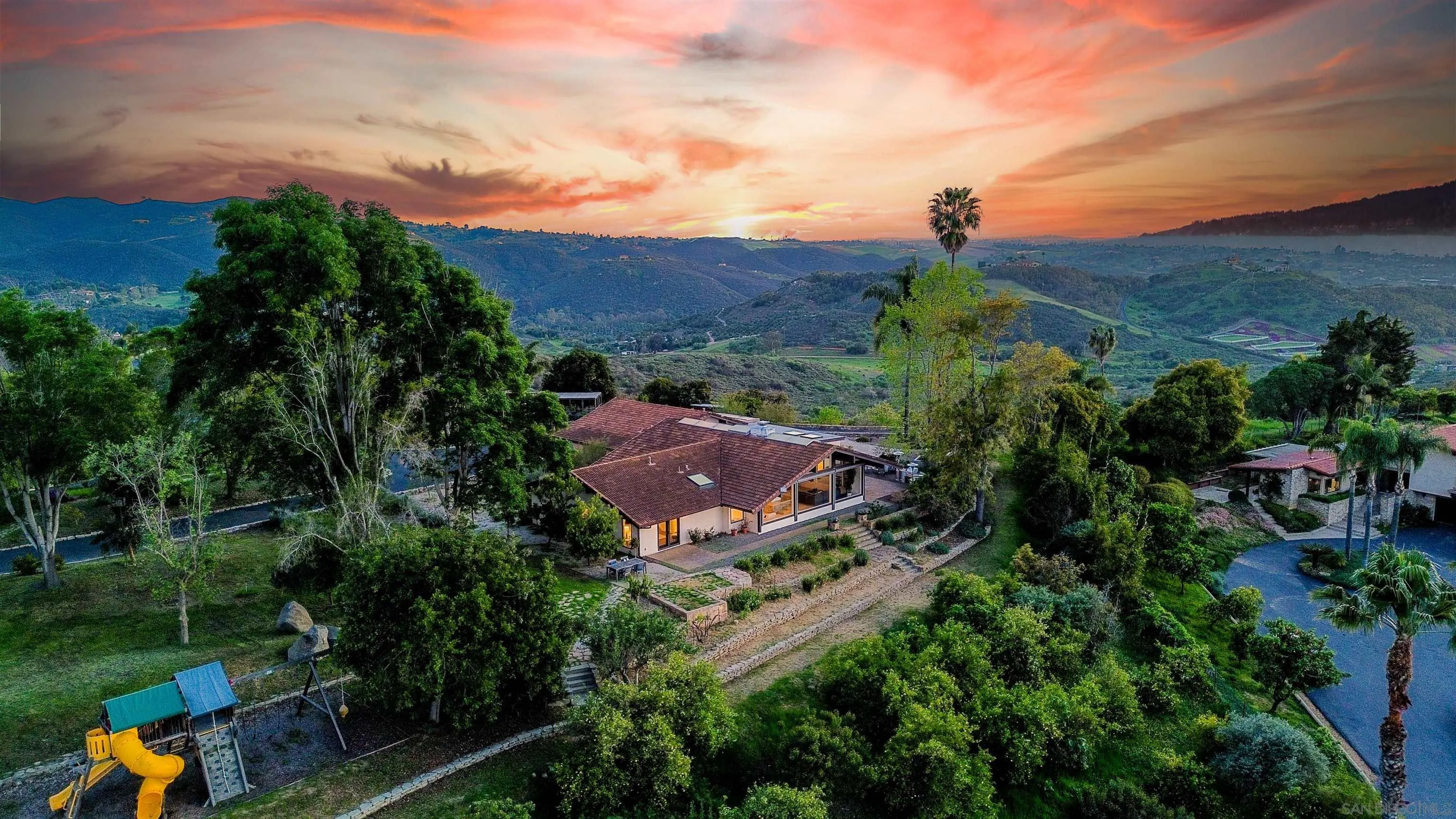 30410 Calle La Reina Bonsall, CA 92003 - Photo 49 of 54 an aerial view of house with outdoor space swimming pool and mountains