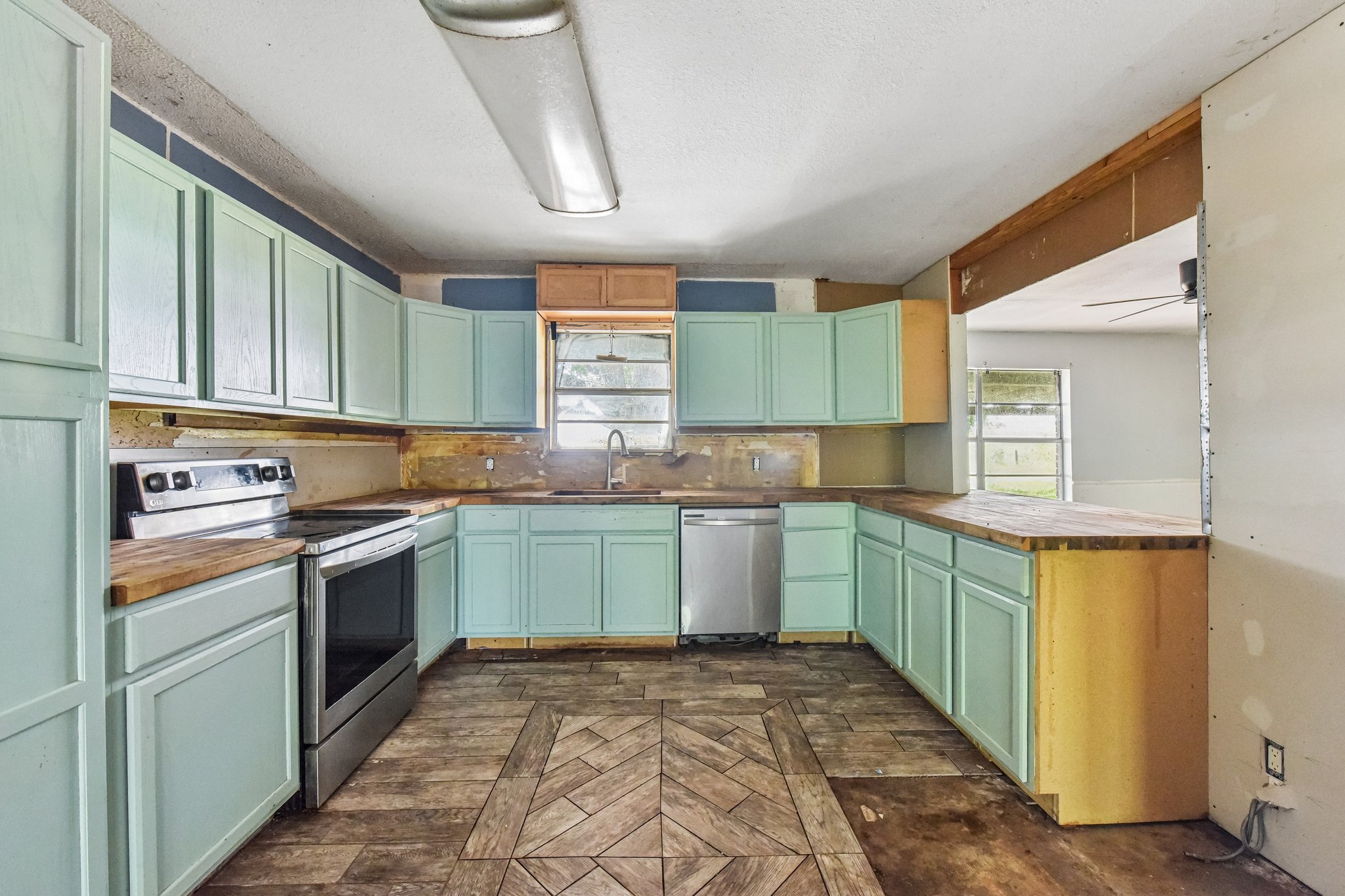 1111 Silent Valley Road Lockhart, TX 78644 - Photo 6 of 14 A generously sized kitchen featuring ample cabinetry and a practical layout.