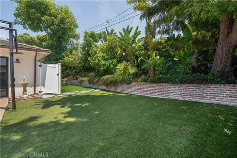 a view of a backyard with a garden