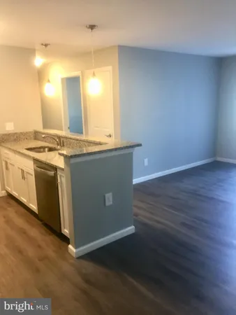 a bathroom with a sink and toilet