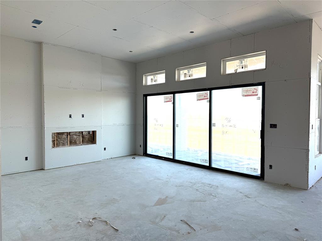9821 Palermo Lane Forney, TX 75126 - Photo 2 of 7 a view of an empty room with a window