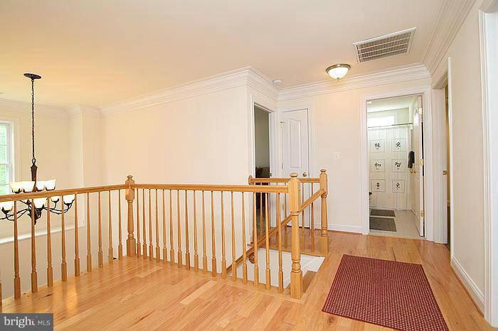 4830 Roop Road Mount Airy, MD 21771 - Photo 3 of 30 a view of hallway with wooden floor