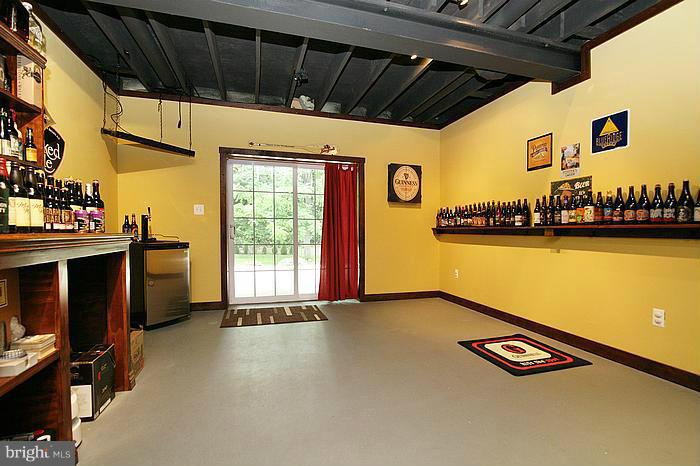 4830 Roop Road Mount Airy, MD 21771 - Photo 22 of 30 a view of a room with furniture and a window