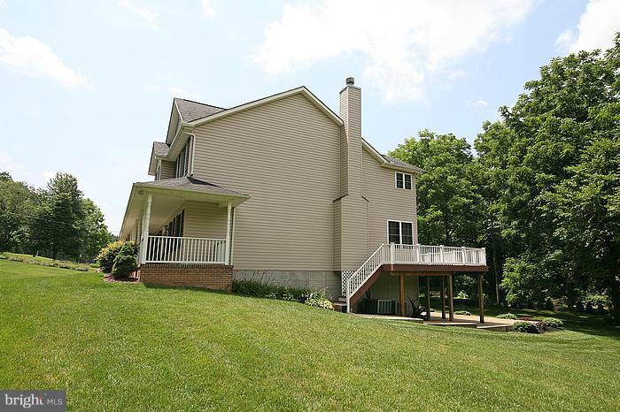 4830 Roop Road Mount Airy, MD 21771 - Photo 29 of 30 a front view of a house with garden
