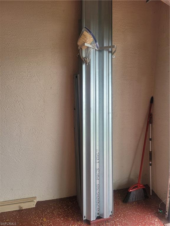 15618 Summit Pl Circle, Unit 396 Naples, FL 34119 - Photo 31 of 41 a view of a hallway with entryway