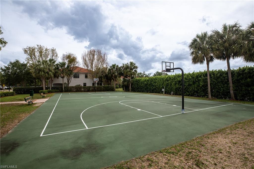 15618 Summit Pl Circle, Unit 396 Naples, FL 34119 - Photo 39 of 41 a view of a tennis court