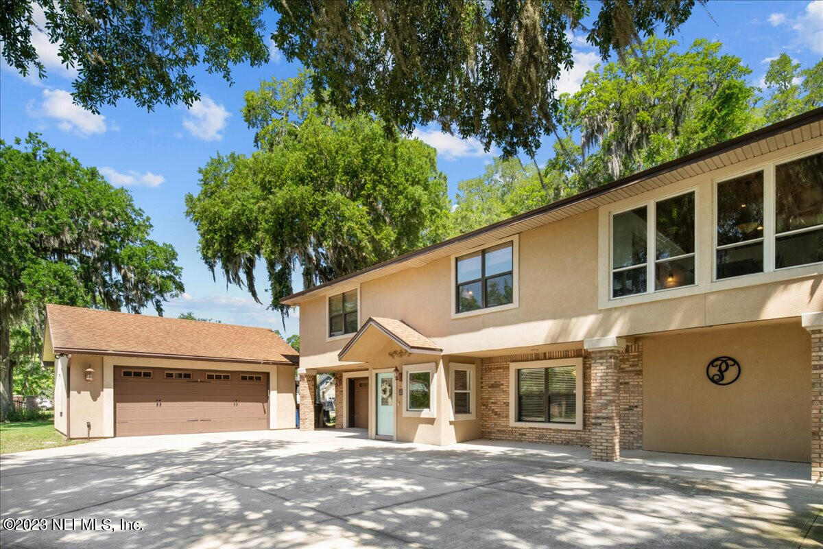 a front view of a house with a garage