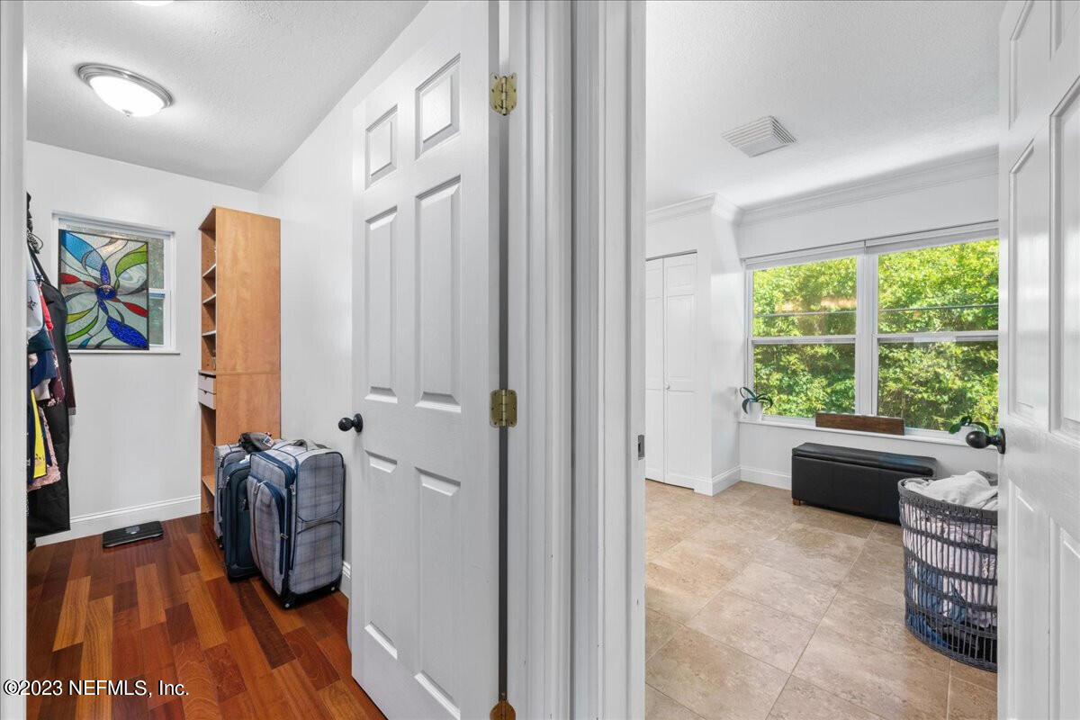 174 Eventide Drive Fleming Island, FL 32003 - Photo 14 of 24 a room with furniture and a large window